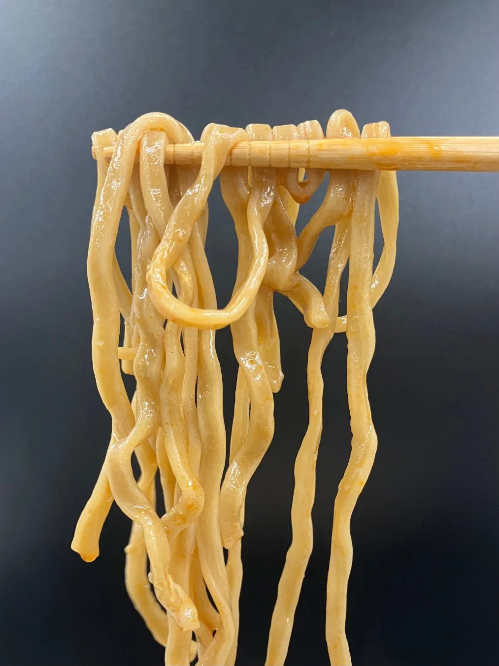Close-up of the thick "washi-washi" noodles