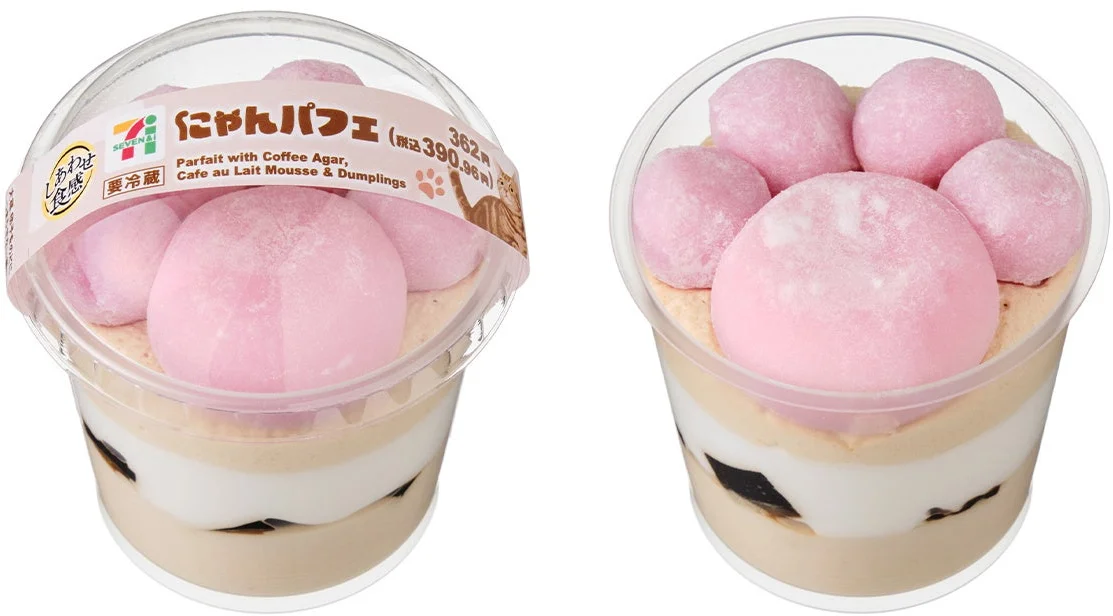 A parfait topped with a pink paw-shaped dango