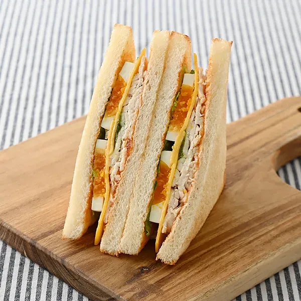 Toasted Sandwich with Japanese Chicken Breast, Boiled Egg, Fresh Basil Sauce, and Cheddar Cheese